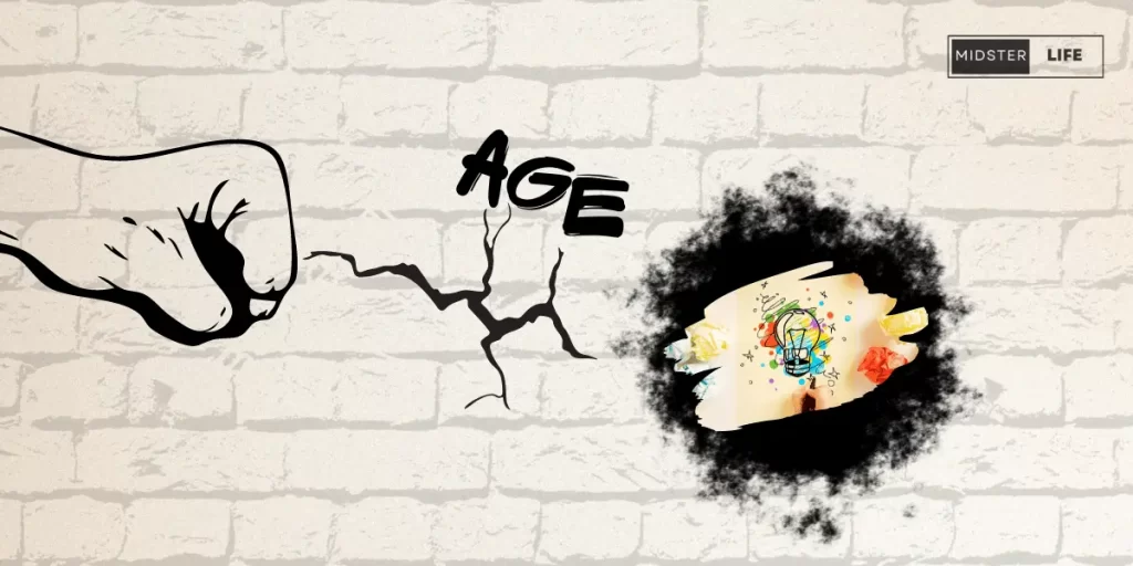  A fist smashing a hole in a wall with "Age" written on it, to expose a lightbulb filled with bright colors and a hand with a pencil drawing. Signifies that age is no barrier to creativity.