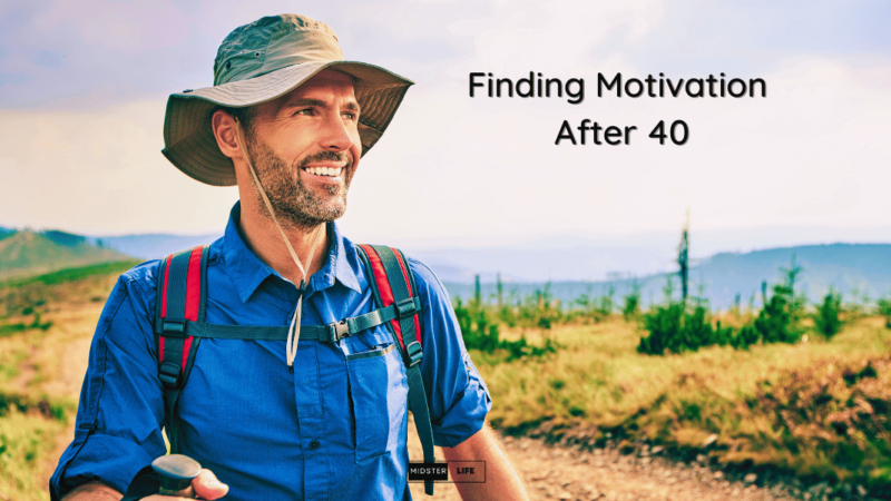 Man in his 40s hiking with a smile on his looking motivated